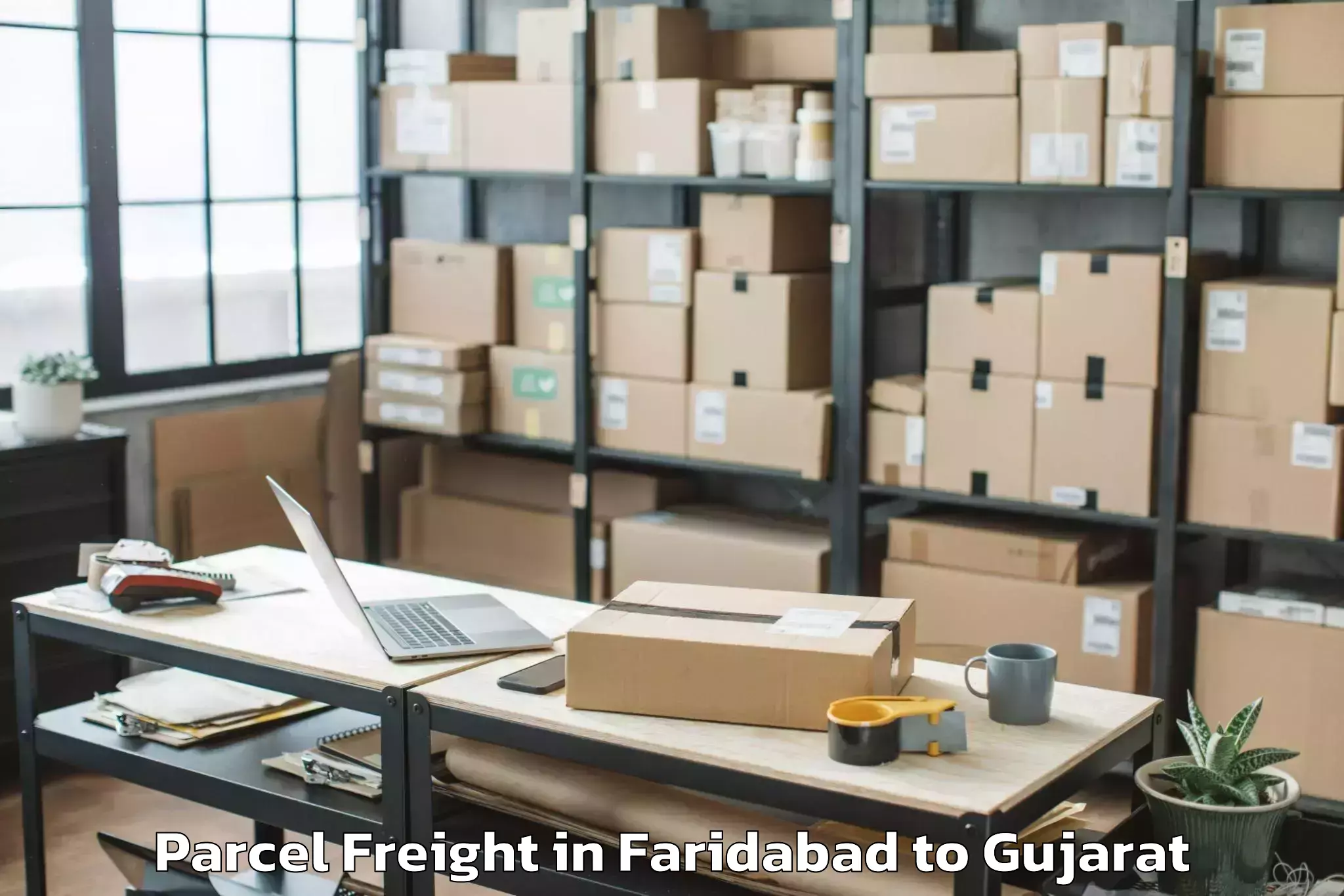 Easy Faridabad to Bhilad Parcel Freight Booking